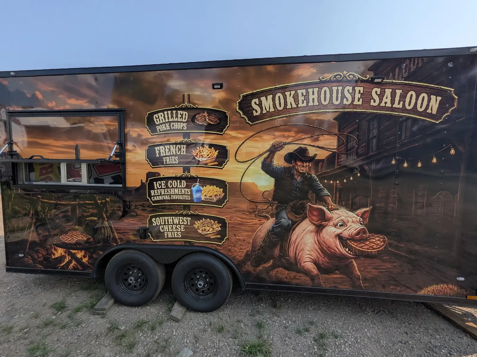 Western-themed concession trailer wrap viewed from the side
